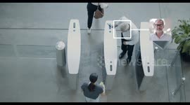 Overhead shot of security gates identifying people with Facial Recognition technology at entrance AI -Artificial Intelligence