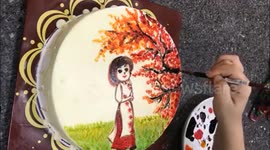 Vietnamese baker paints incredibly detailed picture on top of cake