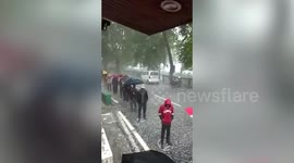 Hundreds brave hailstorm, rains, queue up outside liquor shop in northern India