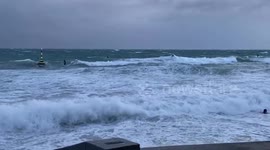 Surfers flock to the sea as several weather warnings issued bracing Australia for storms