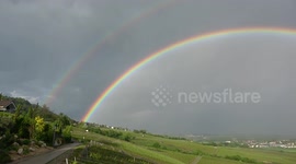 Bright double rainbow captured over Lake Geneva