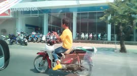 Motorcycle Rider Hand Dances While Listening To Music