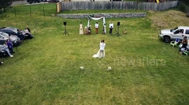 Drone delivers rings at drive-in wedding during COVID-19 lockdown in US
