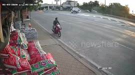 Incredible moment Thai driver hits road barrier,  flips from side to side but somehow avoids crashing