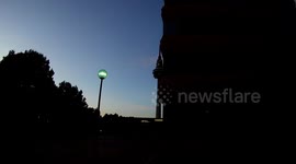 buildings and street lights on the streets of Madrid