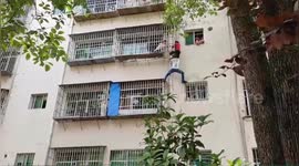 Boy dangles from sixth-floor window in China after grandmother forgets flat keys