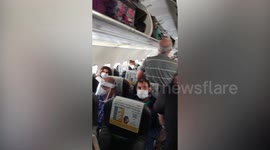 UK carer shocked after she recorded footage of her 'crowded' repatriation flight during coronavirus pandemic