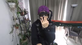 Funny woman from Malaysia scuba diving in house during Covid-19 lockdown