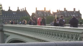 Police, public and NHS staff take part in first May 'Clap for our Carers' on Westminster Bridge