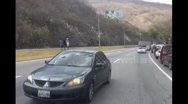 Highway is blocked in Caracas Venezuela due to lack of gasoline in the oil country