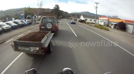 Motorcyclist Narrowly avoids crash