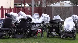 Sad scene as empty wheelchairs sit on lawn outside long term care home near Toronto that has seen 50 COVID 19 coronavirus deaths recently