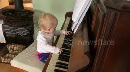 Baby playing the piano
