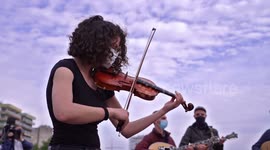 Traditional Greek musicians play protest song Bella Ciao to demand workers' rights amid coronavirus pandemic