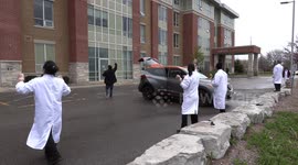 Family members perform outside retirement home on Mother's Day during COVID-19 lockdown in Canada