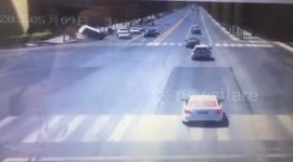Strong winds lift up truck and slam it onto pavement on Chinese road