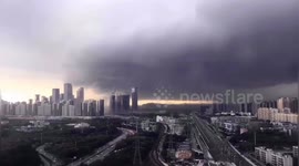 Timelapse footage shows thick clouds swallow Chinese city before rainstorm