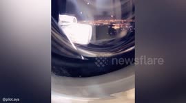 Pilot sets up her washing machine - to look like a plane window