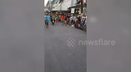 Hundreds of desperate Filipinos queue for financial help during pandemic