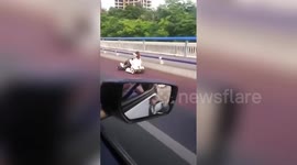 Chinese woman captured driving go-kart on busy road