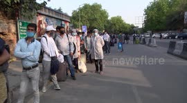Thousands line up to board trains as Indian Railways resume services