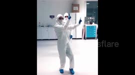 Doctors' dance during a break from treatment of patients