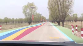 Musical road in China plays patriotic song when cars drive over