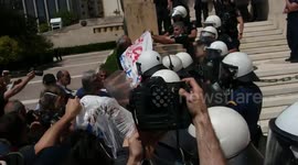 Scuffles erupt outside Greek parliament during education reform protest in Athens