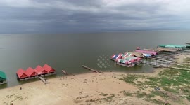 Floating restaurant with customers onboard blown away during storm in Thailand