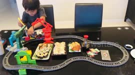 Aussie mother converts son's train set into a sushi conveyor belt restaurant