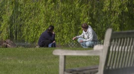 couple meet up after lockdown in park