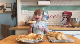 Cute three-year-old chef Susie bakes soft pretzels for all the people staying at home
