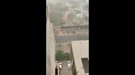 Amazing footage of torrential rain and a dust storm combining over Delhi in India