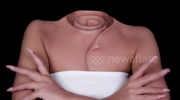 'Unroll me' Artist transforms herself into rolled-up torso painting illusion