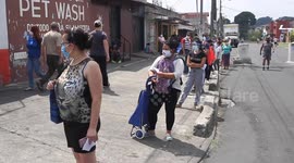 Guatemalans queue for groceries after government tightens COVID-19 restrictions