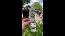 Protesters hand out fuck coronavirus stickers to public