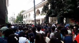Chaotic scenes as hundreds of locals scramble to collect Covid-19 financial aid in the Philippines