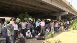 Indian state stops thousands of migrants trying to return to their hometowns a border