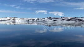 SOUND ON: Flock of loons heard singing at peaceful Icelandic fjord
