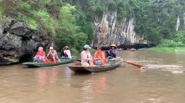 Feet rowing in Tam Coc, Ninh Binh, Vietnam