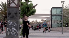 people exercising in port olympic in barcelona in the evening during the coronavirus pandemic