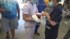 Newborn baby girl rescued by American expat after being abandoned on roadside in Thailand
