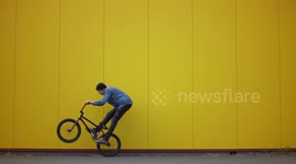 Cool artistic BMX bike Balance trick on Backwheel in Slowmo