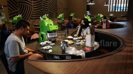 Thai restaurant puts dinosaur figures on seats to separate customers during coronavirus pandemic