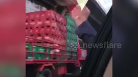 Trucks deliver alcohol to Manila as coronavirus restrictions ease