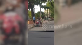 Kind policeman gives food to homeless family during coronavirus struggle in the Philippines