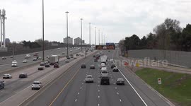 Highway signs in Toronto Canada reminding people as lockdown restrictions ease to still keep physical distance during COVID 19 coronavirus new normal
