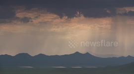Rain Clouds Above Mountains