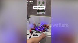 Dad recreates an arcade claw 'grabber' machine at home