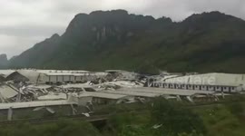 Chinese factory collapses in strong winds and rainstorm, killing two